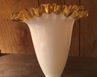 White opaque vase with golden ruffles, about 8-inches tall. 