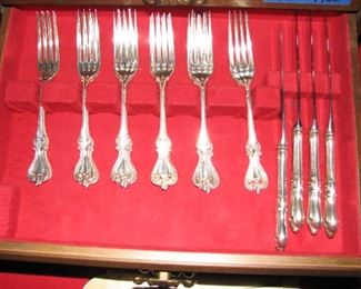 the next 3 pics are of this sterling flatware set