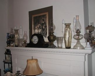 mantle clock, many oil lamps and pair of tall vases