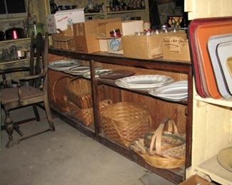 baskets, holiday party trays and the cabinet they are in is bar or counter