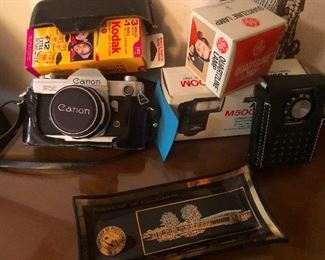 lotsa vintage cameras and camera equipment