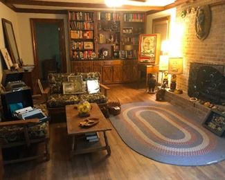 room that invites you to sit down, smoke a pipe, and drink rum from a bottle