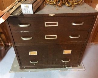 cabinet with six sleepy eyes