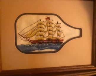 rare ship in a bottle with actual ocean also in the bottle