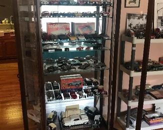 2nd of 2 matching lighted double glass framed front door curio cabinets! This one is filled with Franklin Mint cars and Trucks. Several unbuilt vintage car model kits too! CABINET SOLD!