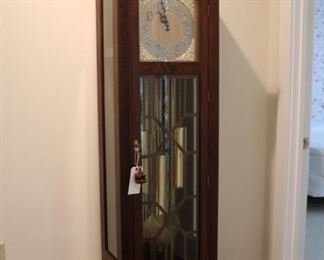 Kuempel chime clock.  Keeps time very nicely. Chimes work but not always on the hour.