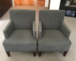 Pair of contemporary grey fabric arm chairs w/wood legs 
