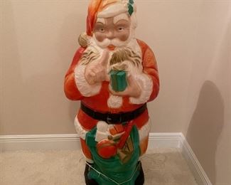 $125.  Poloron Whispering Santa's a little faded but hey, you would be too if you were 60 years old.