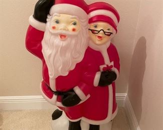 $75 -Mr. and Mrs. Claus look like we just interupted them doing something and they're trying to hide the evidence and not look suss about it.  Spoiler - it's not working.  