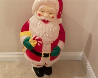 $45 - This Santa looks like Tim Allen from the Santa Claus.  Except this guy came out first so I guess its more correct to say that Tim Allen in the Santa Claus looks like this Blow Mold