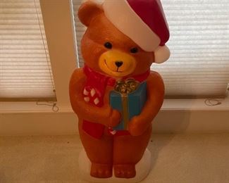 $50 - This bear has gotten you the perfect present and he cannot wait for you to open it - seriously if you don't open it right now, he's just gonna blurt out what's inside and that ruins the whole experience.