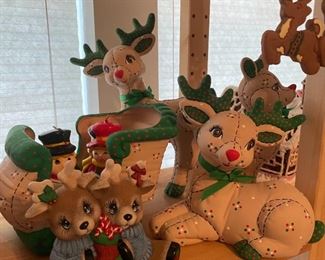 The reindeer are playing hide and seek with the two Caroler candle kids and doing that adult thing where they know exactly where they are but are looking EVERYWHERE else pretending they don’t know.  Ah, kids are so stupid.