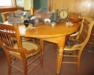 Drop leaf table with leaves. Set of 6 chairs. Country kitchen items. Wooden bowl, coffee grinder, scale & more...