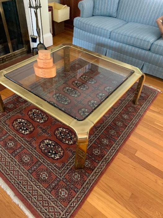Brass and Glass coffee table and oriental  rug