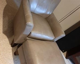 This is also a Smith chair and ottoman.  It is real leather and very comfortable.  There is a little wear but still in great shape!