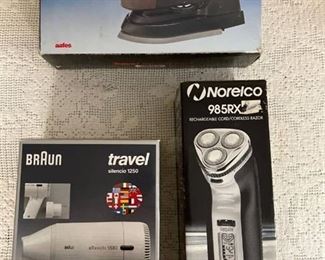 Travel accessories - steam iron, hair dryer, and razor (razor works when plugged in)