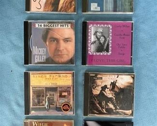 Eight country CDs featuring Wynonna, Gilley, and Willie Nelson