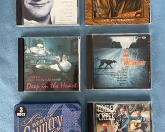 Eight country CDs featuring Roger Miller, Zac Brown,, and more