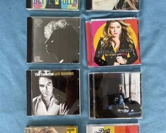 Eight pop and classic rock CDs featuring Midler, Dion, Streisand, Clarkson, Diamond, Carole King, and Aguilera