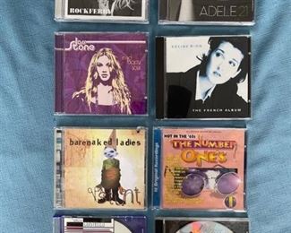 Eight pop and classic rock CDs featuring Duffy, Adele, Dion, Barenaked Ladies, Costello, Madonna and more