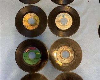 Eight oldies but goodies 45 rpm records featuring Beatles, Carpenters, Deep Purple, Sam the Sham and more