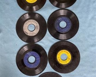 Seven 45 rpm records featuring Christmas songs