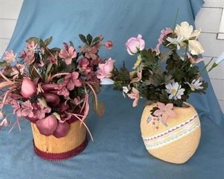 Two artificial floral arrangements