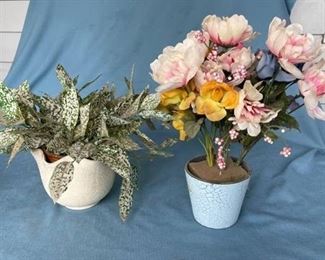 Two artificial floral arrangements