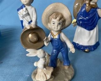 Three ceramic figurines - 8 inches tall
