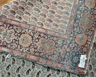 ANTIQUE FLAT WOVEN RUG | Having an overall pattern within a floral motif border; 6 ft. 4 in. x 4 ft. 
