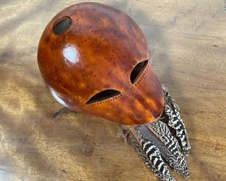 GOURD & FEATHER MASK | Tribal mask suspending feathers, with wire for wall hanging; overall 16 x 9 x 5 in. 