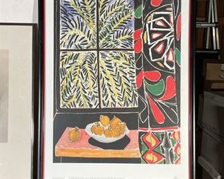 (2pc) FRAMED POSTERS | Including Carol Marino "Fleurs de Lumiere" at the Jane Corkin Gallery, West Toronto in a thin silver frame under glass (overall 26 x 19-3/4 in.) and a Henri Matisse poster print "Interieur au Rideau Egyptien 1948" in a black frame with red lacquer interior trim (overall 33 x 24-3/4 in.) 