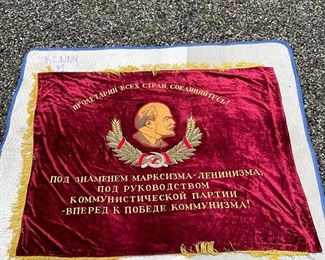 USSR LENIN FLAG | Soviet Union era flag of heavy red crushed velvet with gold tassels, with embroidered text and bust of Lenin on one side and the state emblem on the other side; 52 x 64 in. 