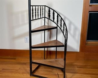 WROUGHT IRON LIBRARY STAIRS | Spiral library stairs, having three wood steps in a black wrought iron frame; h. 41 x w. 18 x d. 27 in. 