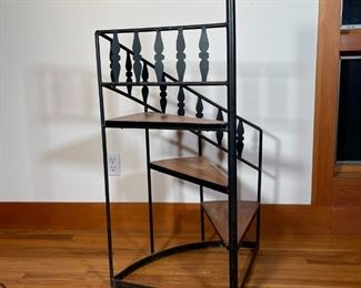 WROUGHT IRON LIBRARY STAIRS | Spiral library stairs, having three wood steps in a black wrought iron frame; h. 41 x w. 18 x d. 27 in. 