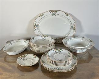 SET BOOTHS CEYLON IVORY CHINA | Made in England, Silicon China, decorated with bird and floral pattern, including an octagonal bowl and plate, an oval dish, a serving platter, 6 saucers, 4 bowls, 3 salad plates, and 7 luncheon plates (dia. 8-3/4 in.), and 3 10 in. plates; [with wear to decoration, commensurate with age, some pieces with chips] 