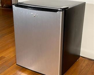 WHIRLPOOL MINI FRIDGE | Compact refrigerator with a black case and a stainless steel door, it works! Model no. WH27S1E; h. 25 x w. 19 x d. 20 in. 