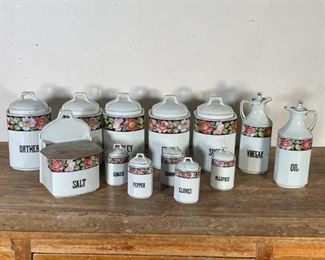 CZECH SANFT CHINA SET | Kitchen storage set including open jars/pitchers and lidded canisters, with gilt half rim and pink floral pattern, the bottoms marked "Sanft China / Made in Czechoslovakia" 