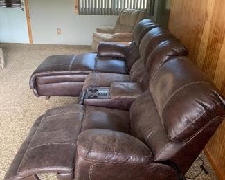 SIDE VIEW OF LEATHER SOFA. LEATHER ELECTRICAL MASSAGING RECLINER SOFA WITH CHAISE LOUNGE.  MASSAGE & HEAT.  ALL THREE PIECES RECLINE AND THE CHAISE LOUNGE RECLINES ALL THE WAY DOWN. 