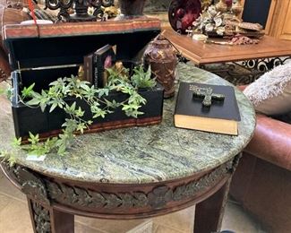 Marble top table with decorative trim
