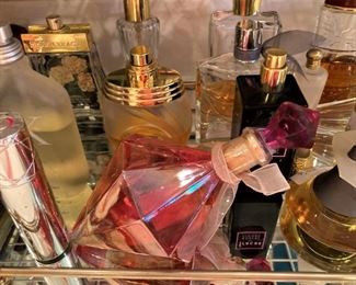 Mirrored tray; more perfume bottles