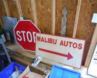 Stop Sign and Malibu Autos Sign