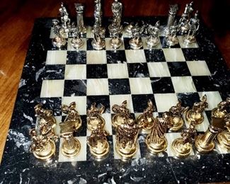 Marble chest board w/ silver and gold playing pieces 