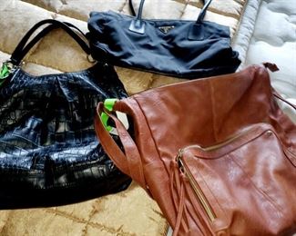 Coach purse, Prada bag. Leather bag 