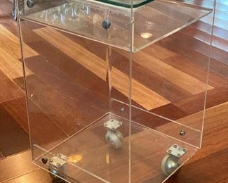 Acrylic end table on casters