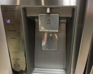 Ice & water in door of refrigerator 