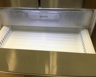 Shelf over freezer