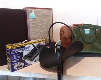speakers / luggage / fireplace item / sweeper