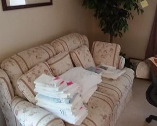 sofa / bath towels / tree