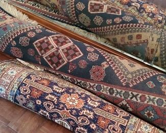 many hand made rugs 